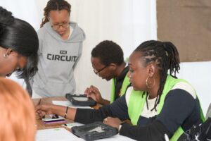 A young voter consults an Independent Electoral and Boundaries Commission clerk at a registration center as Kenyan youth continue to register in large numbers ahead of the 2027 elections. Picture/IEBC