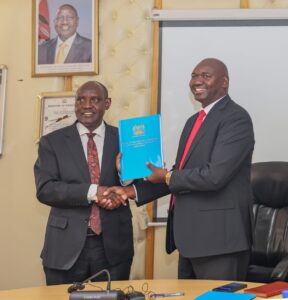 Outgoing Basic Education Principal Secretary Prof. Julius Bitok (right) hands over the State Department for Basic Education to his successor, John Lekakeny Ololtuaa, during a transition ceremony held on June 11, 2026, following the recent government reshuffle that reassigned the two Principal Secretaries. Picture/Courtesy of Julius Bitok